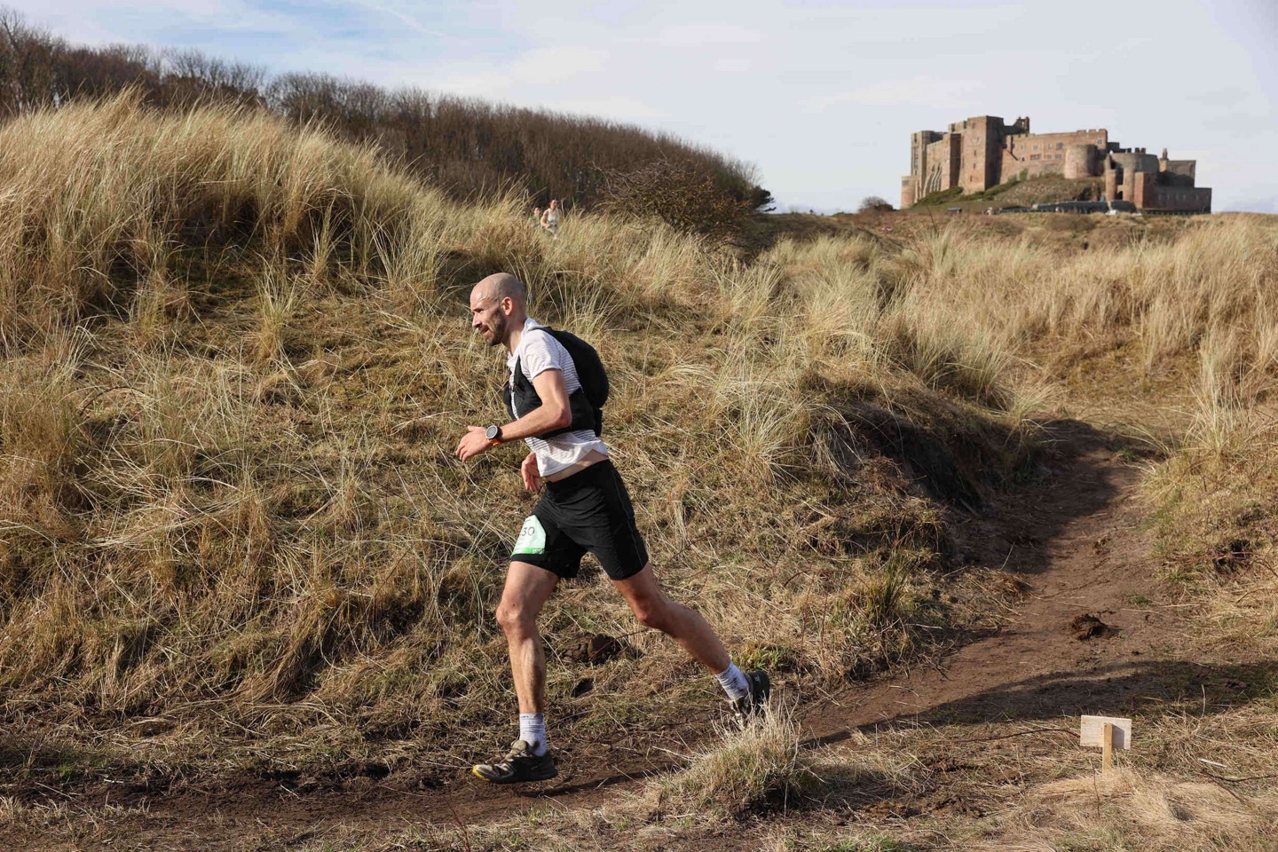 Running through the dunes at Bamburgh
