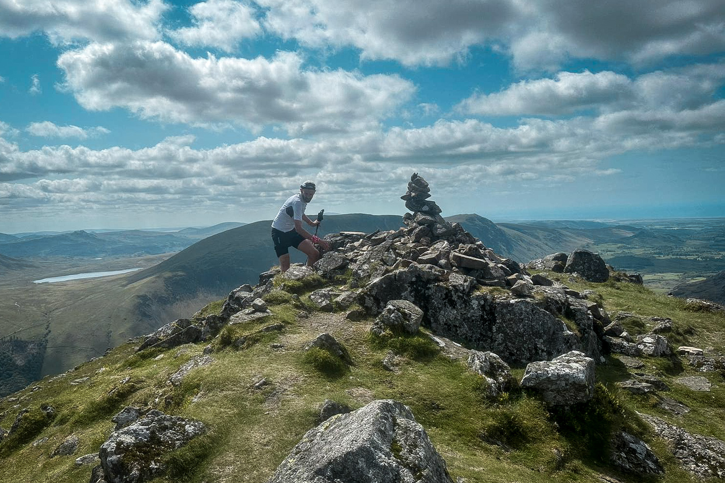 Pete approaches the cairn at the top of Yewbarrow